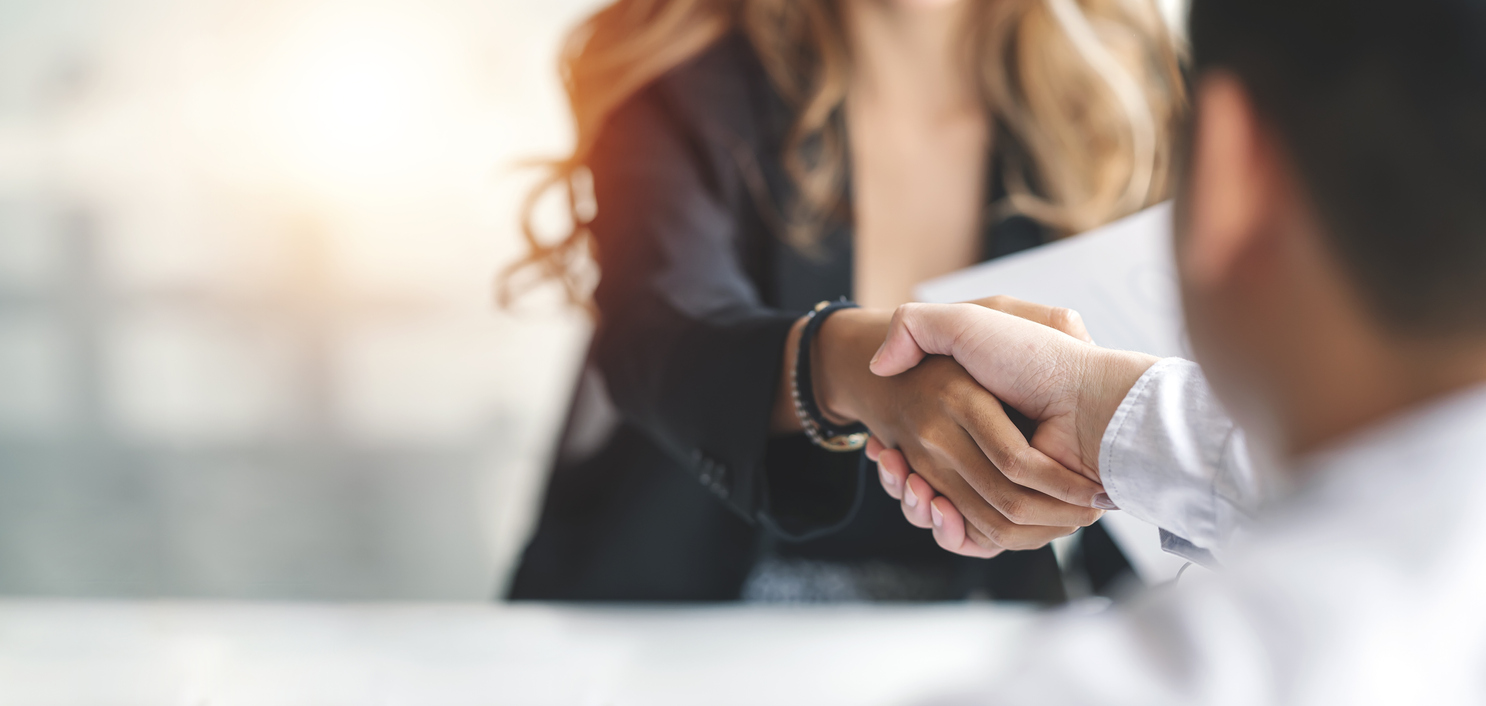 Business people shaking hands